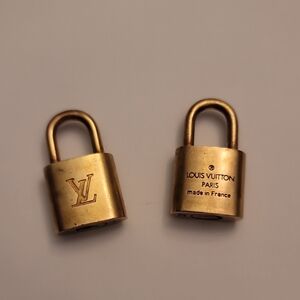 Two Louis Vuitton Luxurious Gold Locks *free gift w/purchase*